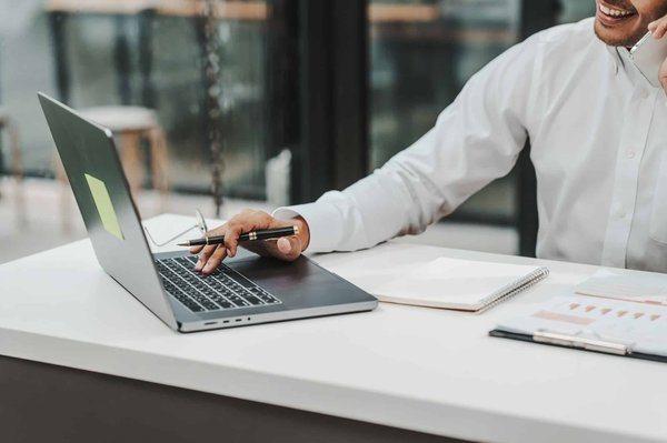 How to obtain the necessary licenses for a UK company dealing in financial services?